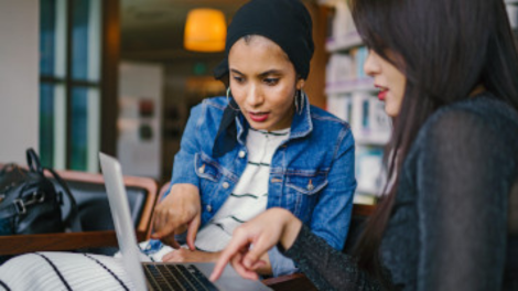 Business students working at a computer