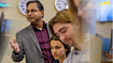 Business professor and students in a classroom