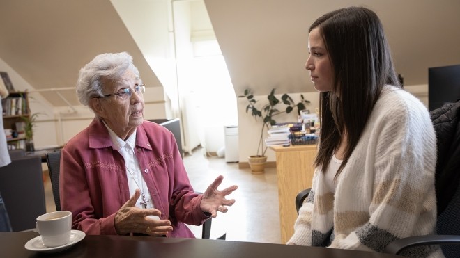 Sister Dorothy Moore talking with student and scholarship recipient Trish Thomas