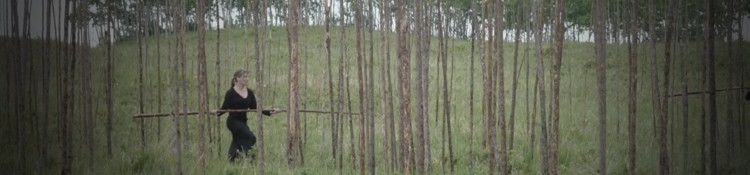 an image of a lady in the woods