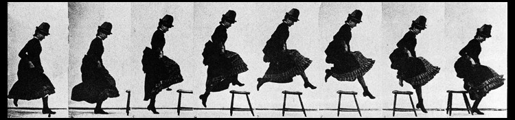Old black and white image showing lady jumping over chair
