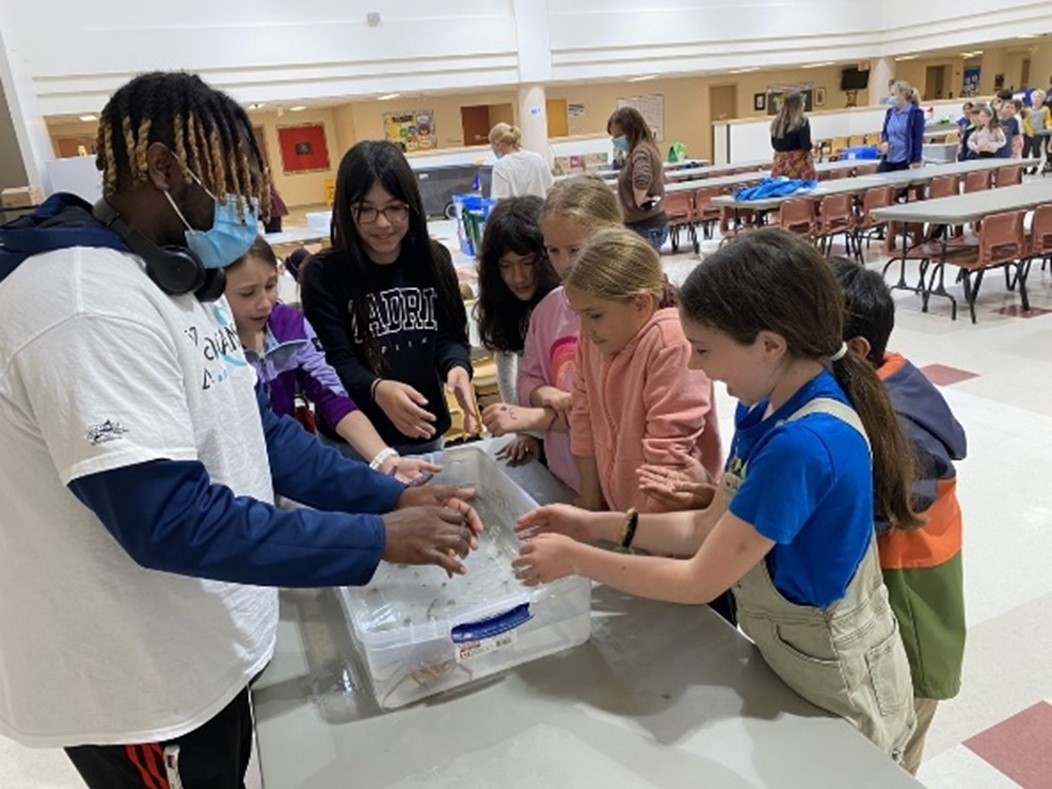 Students at the Lab Touching a Crab