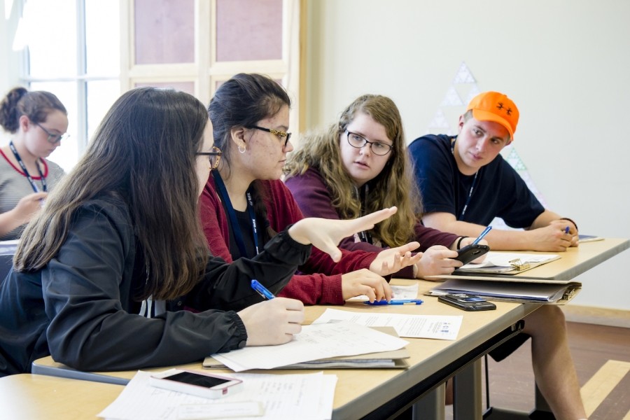 Picture of math camp members working together