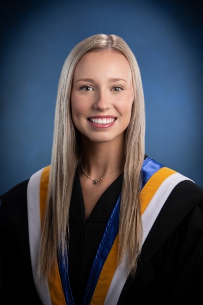 Graduation photo of blonde person