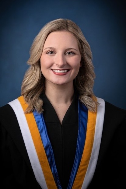 Graduation photo of blonde person