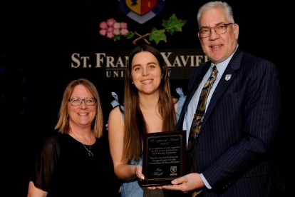 Iris Magill receiving the X-Ceptional Award