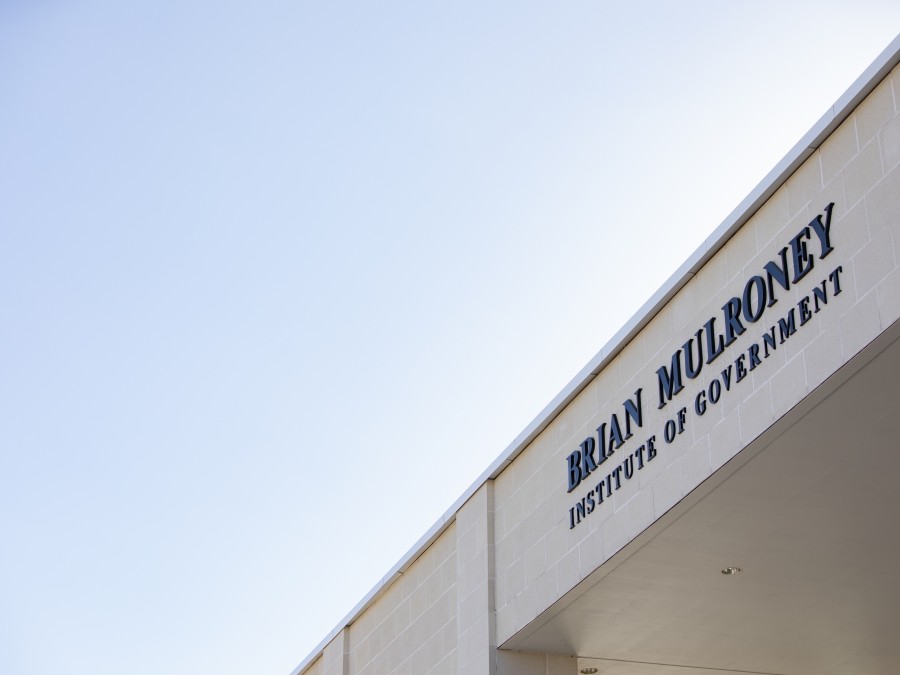Building with large letter reading Brian Mulroney Institute of Government against a blue sky.